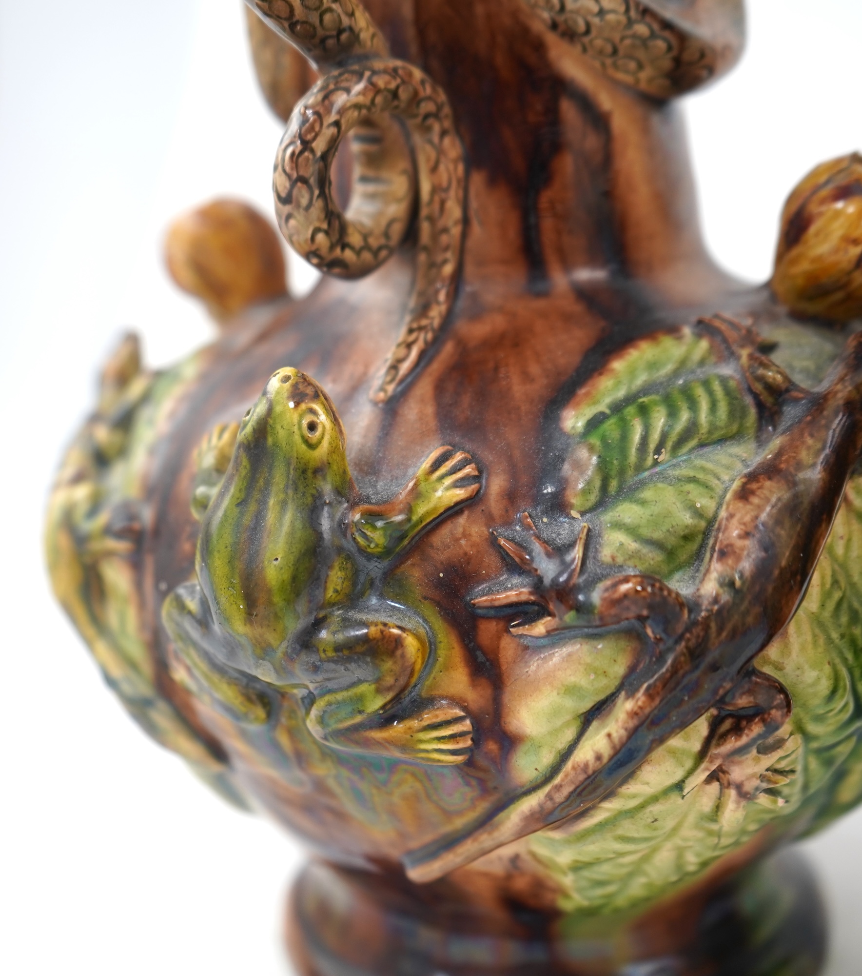 A pair of Palissy ware two handled vases, by Mafra Caldas Da Rainha, late 19th century